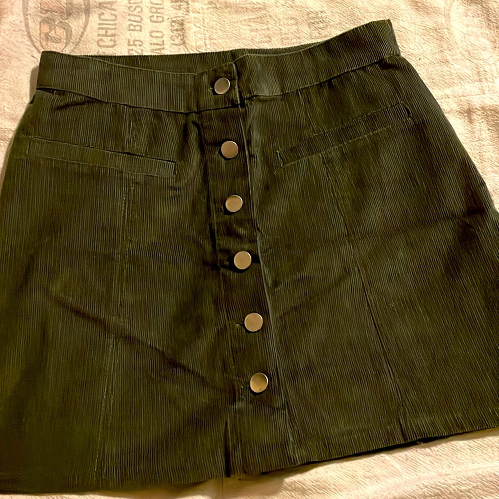 Mini green skirt. No brand